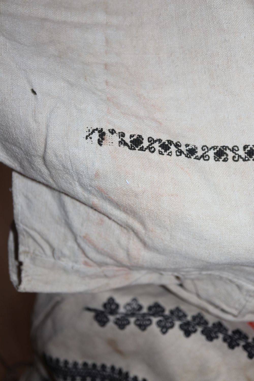 An embroidered Turkish towel, together with a linen embroidered blouse